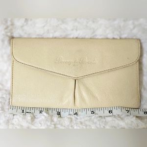 Dooney & Bourke ivory trifold wallet used